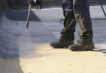 Coating systems over Halifax spray foam roof systems
